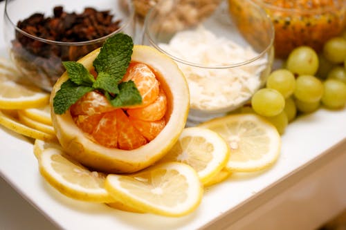 Photographie En Gros Plan De Tranches De Citron Et De Fruits Orange