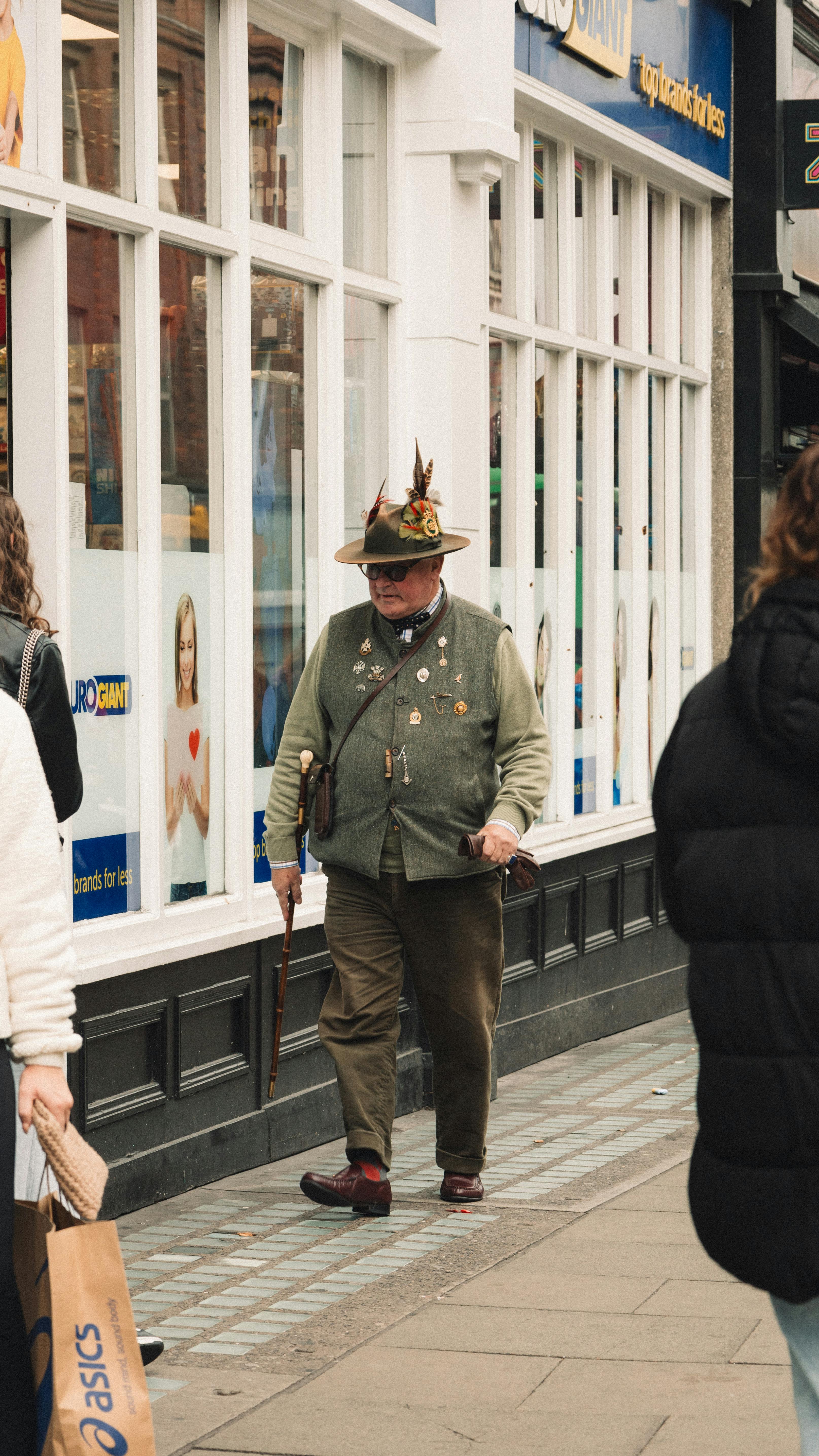 man in traditional bavarian attire on street