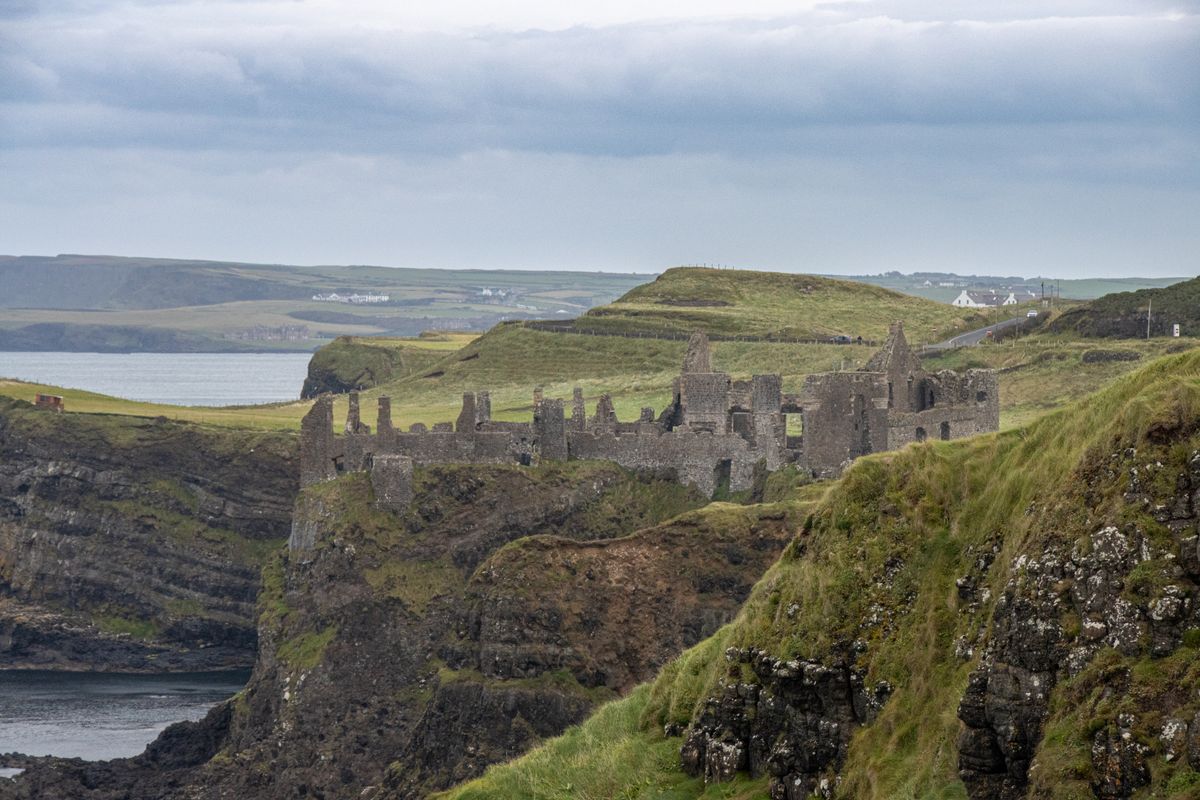 The ruins of Dunluce castle on a rocky headland
