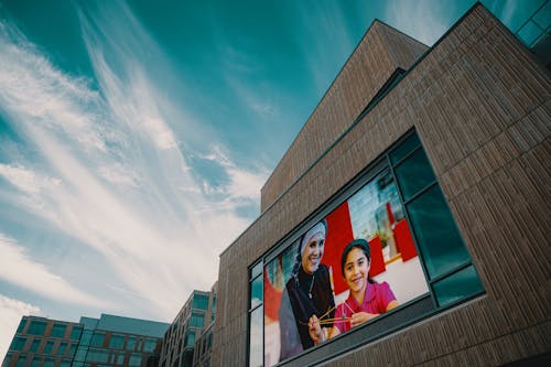 A Giant Screen On A Building Wall