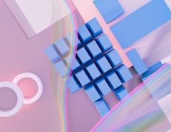 Blue cubes catching a spectrum of reflected light — photo by Steve A Johnson on Pexels