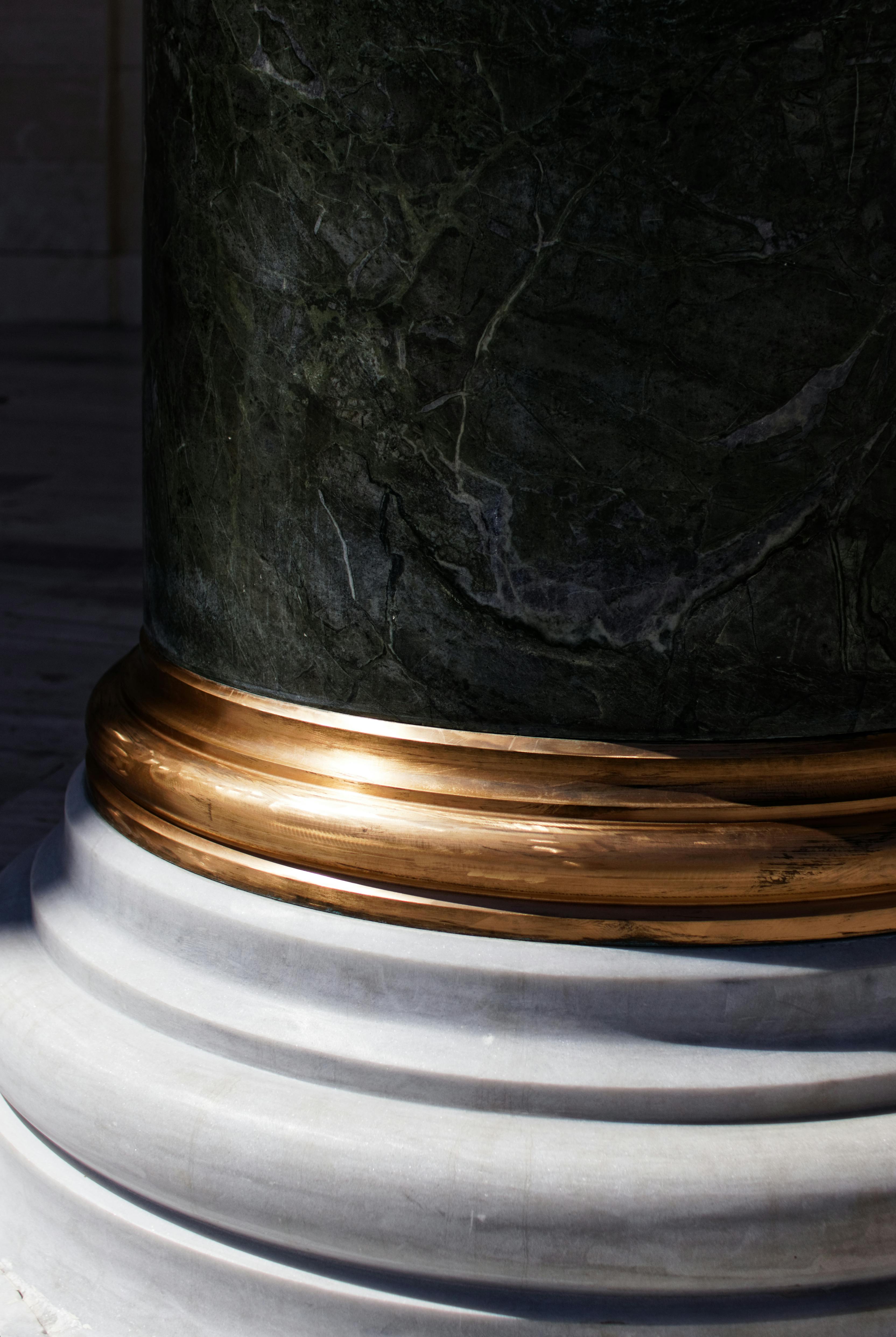 black brass colored and white pillar