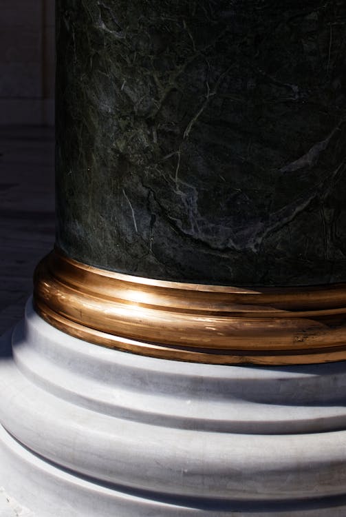 Free Black, Brass-colored, and White Pillar Stock Photo