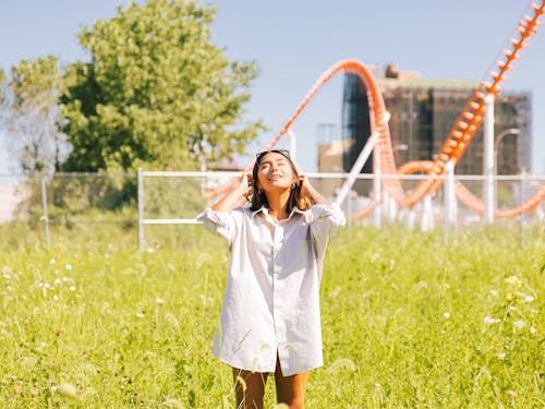 Woman Standing On A Field 