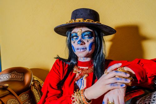 Free A colorful Catrina portrait representing Mexican Day of the Dead traditions with intricate face paint and traditional attire in Mexico City. Stock Photo