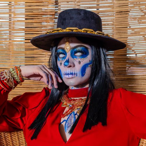 Free Stunning portrait showcasing Day of the Dead makeup and outfit. Stock Photo