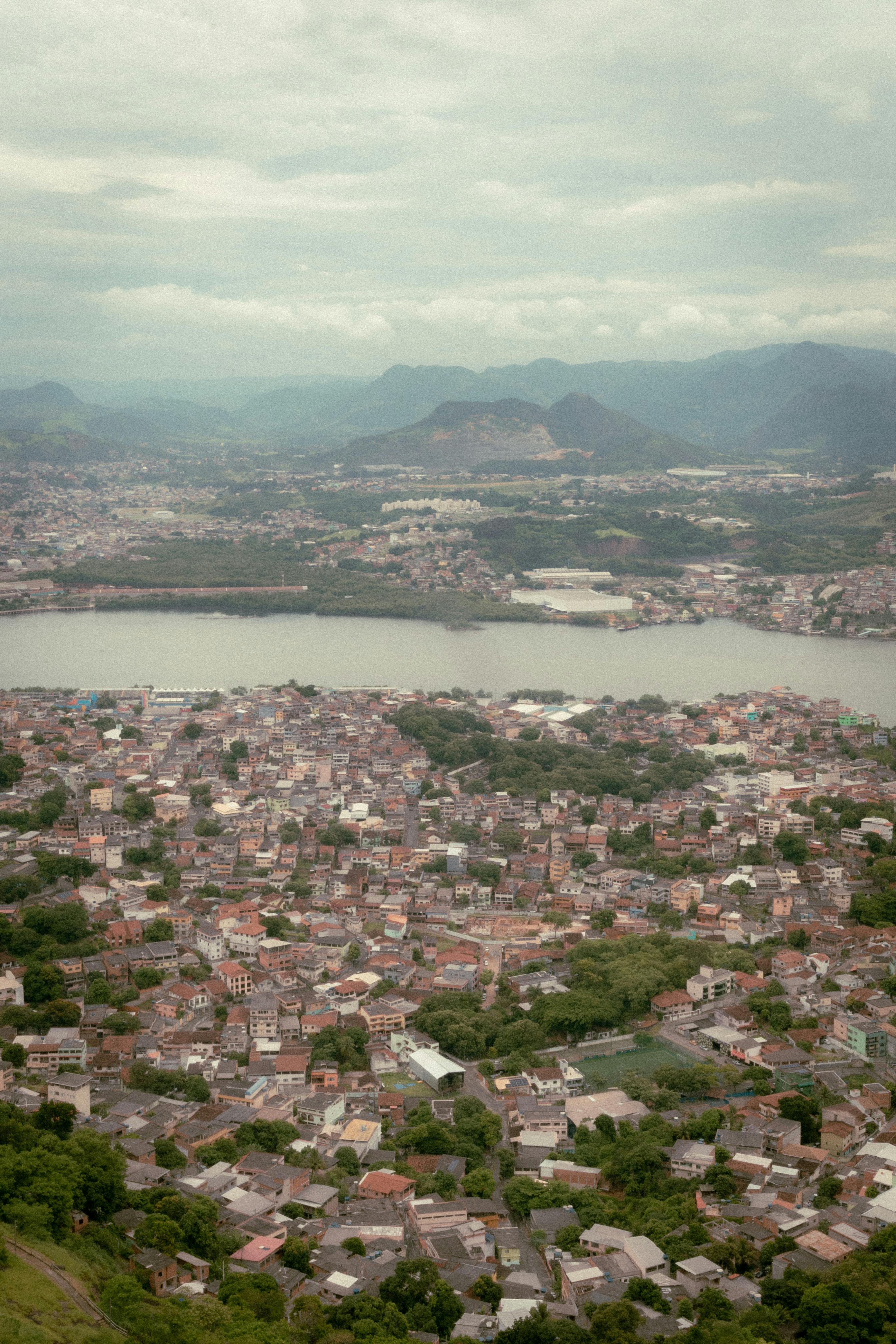 Stunning aerial view of Vitoria, ES, Brazil showcasing urban architecture and lush landscapes.