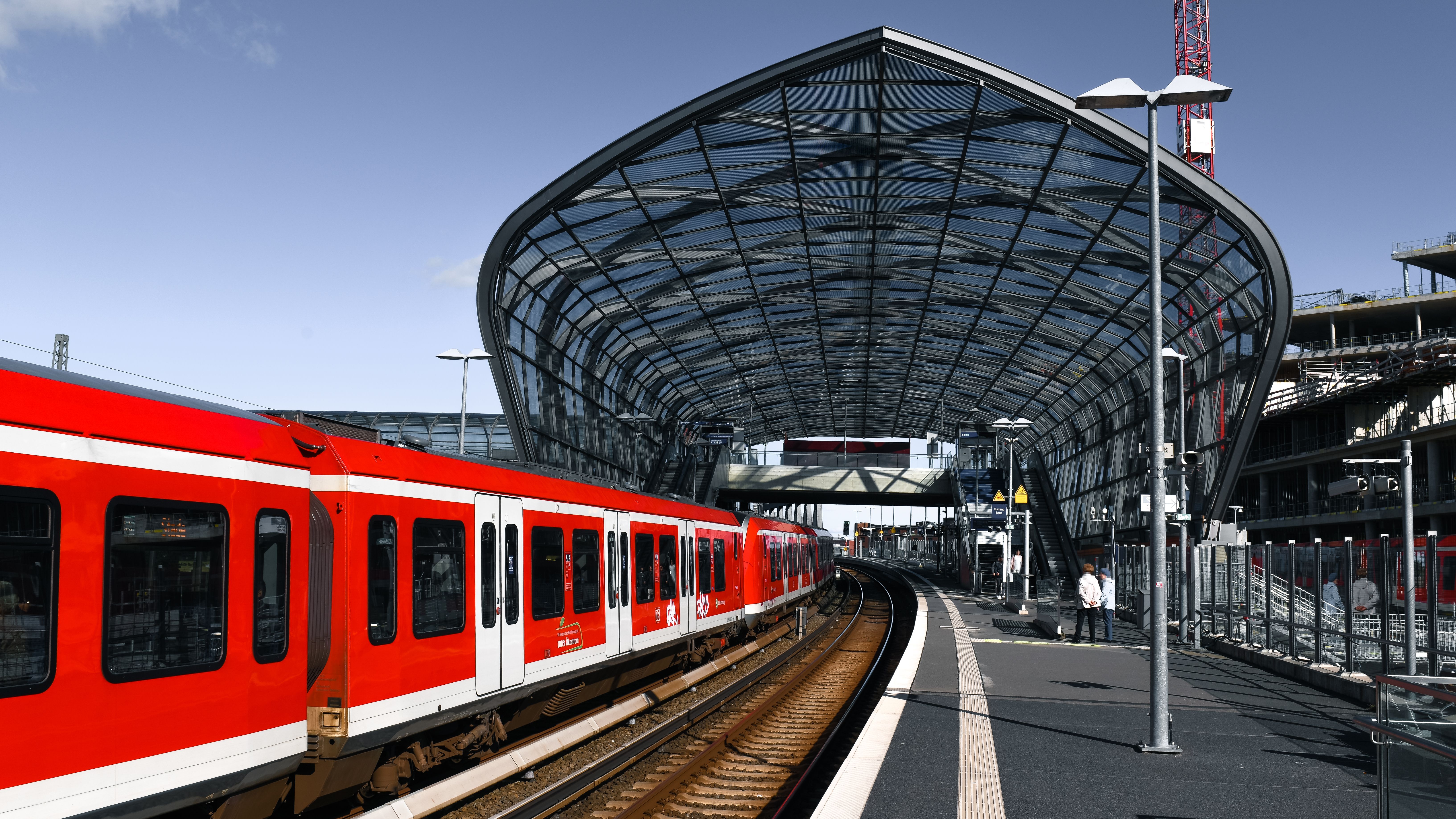 Futuristic train station design at Hamburg's Elbbrücken station, showcasing modern transit architect
