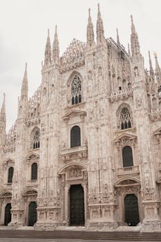 Capture of the majestic Duomo di Milano, showcasing its intricate Gothic architecture in Milan, Italy.