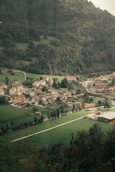 Scenic aerial view of Saint Moritz village nestled in lush Swiss Alps landscape