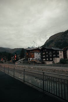 Beautiful view of Zermatt village with Matterhorn in the background, showcasing nature and architecture.