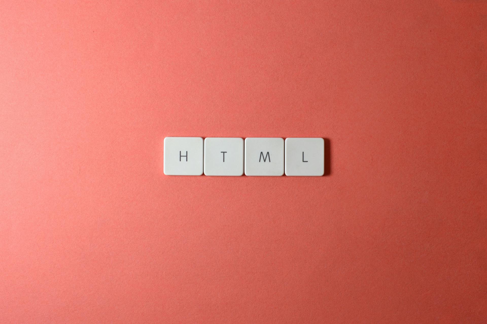 Minimalist design of HTML letter tiles on a salmon pink surface.