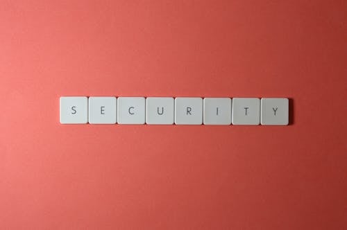 Close-Up Shot of Keys on a Red Surface