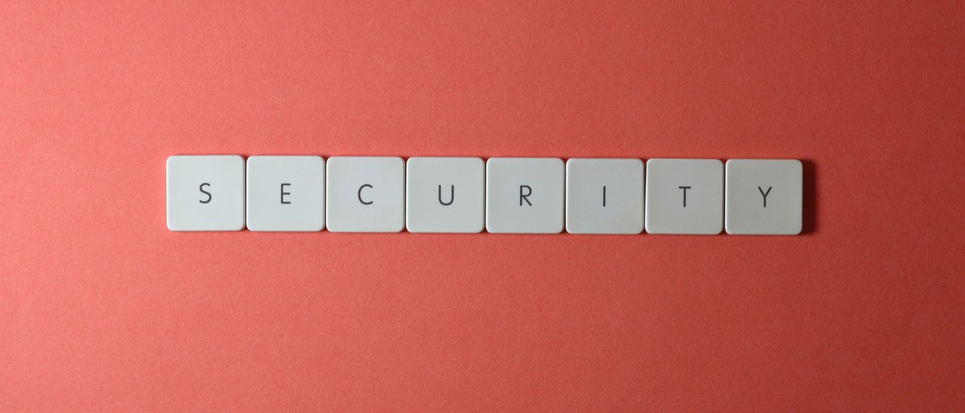 Abstract image showing a lock icon over a SharePoint logo, representing a security vulnerability and the need for cybersecurity SMB solutions.