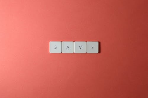 Close-Up Shot of Keys on a Red Surface