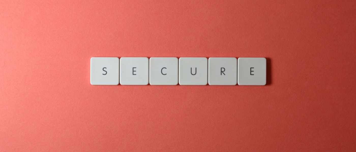 A padlock icon superimposed on a WordPress logo, illustrating a critical security vulnerability and the need for immediate action for SMB cybersecurity.