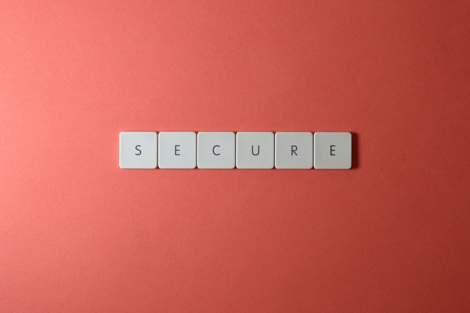 The word Secure spelled out with tiles, representing privacy and data security