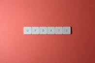 Close-Up Shot of Keys on a Red Surface