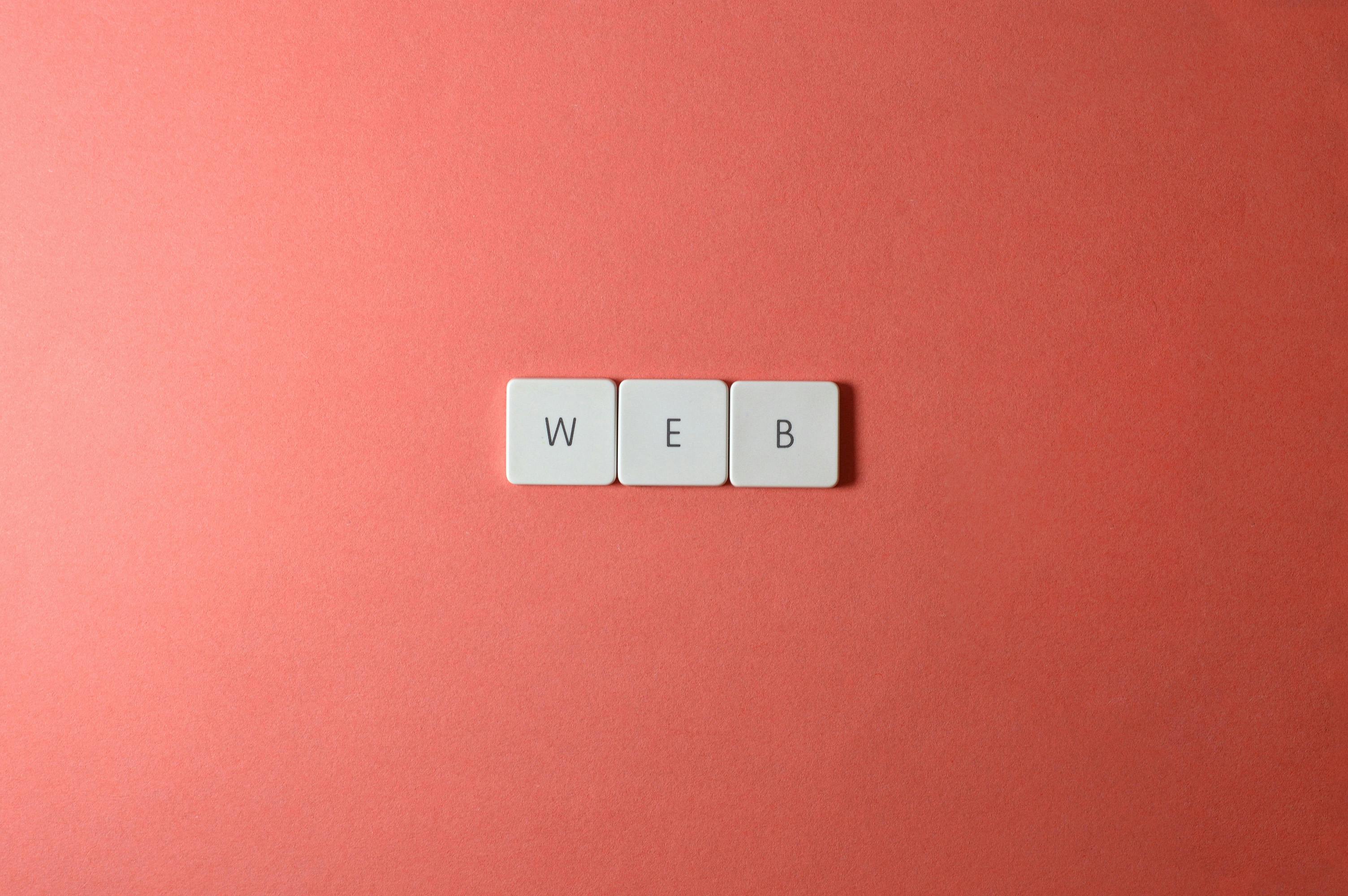 close up shot of keys on a red surface