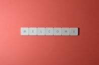 Close-Up Shot of Keys on a Red Surface