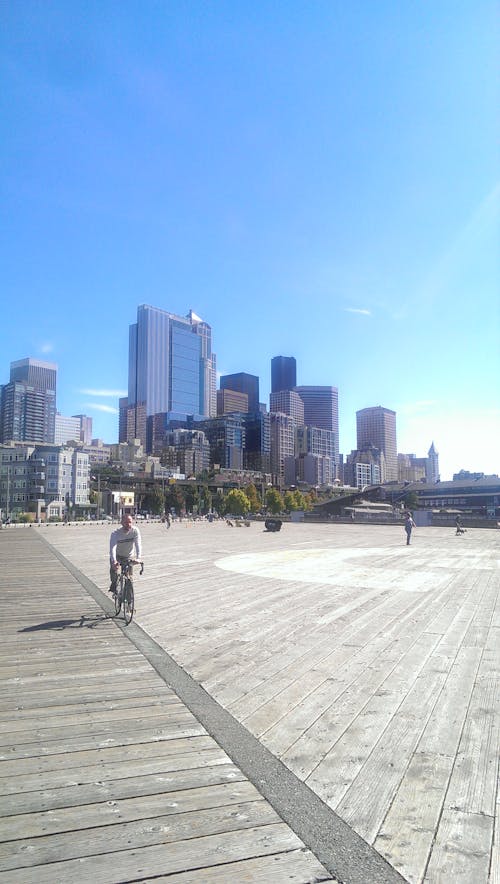 Foto profissional grátis de beira-mar, bicicleta, cais