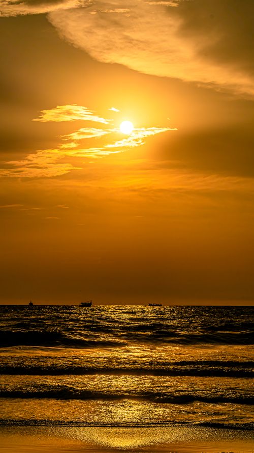 Free Ships at sunset Stock Photo