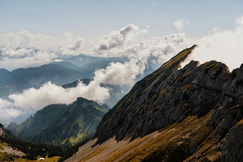 Free Stunning landscape of mountains and clouds creates a serene, natural view. Stock Photo