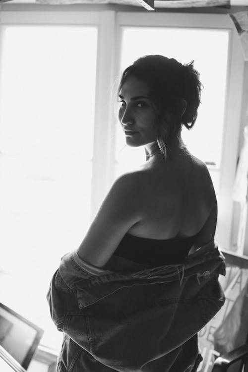Monochrome Photo Of Woman Wearing Denim Jacket