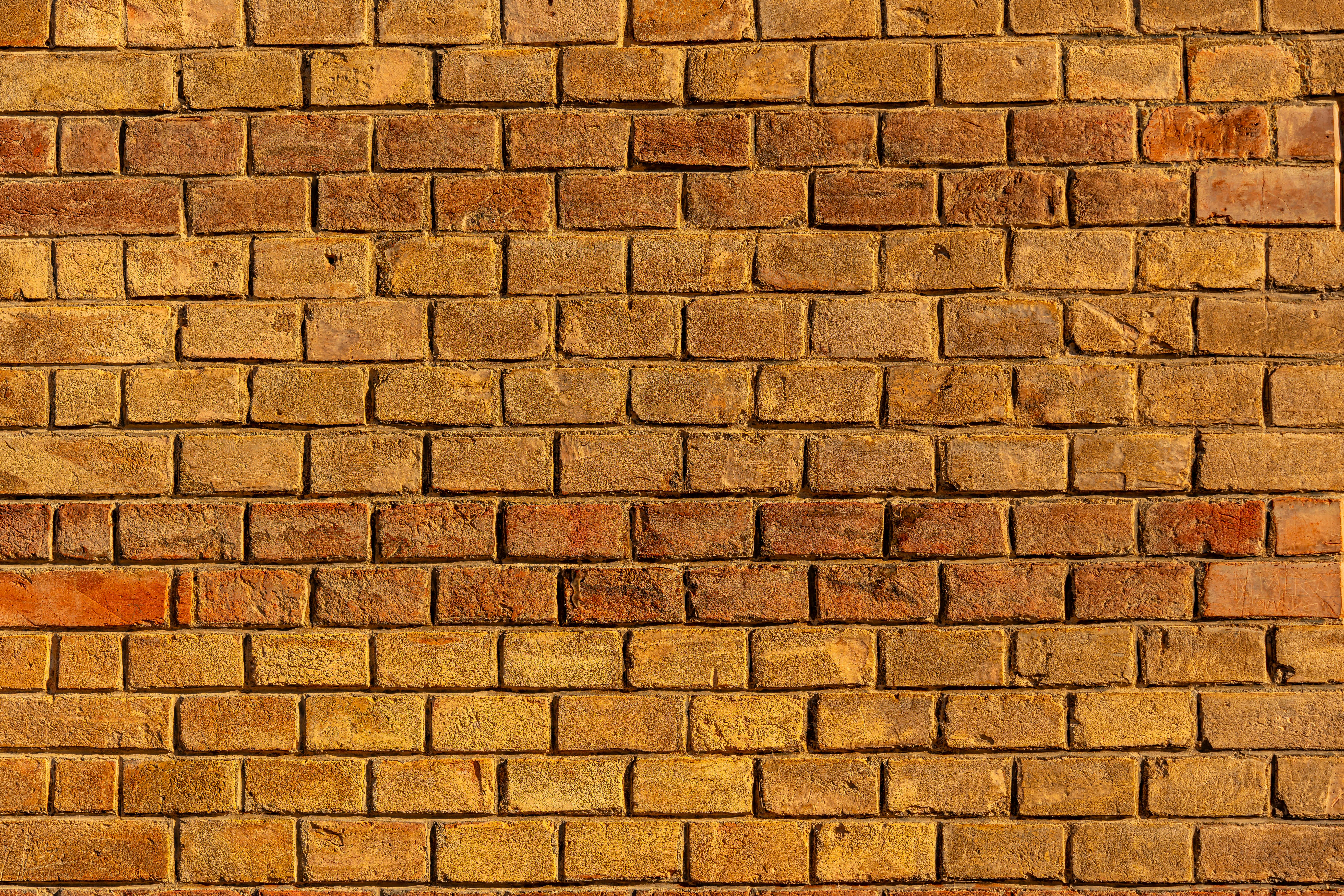 Gratis Motivo Di Sfondo Con Muro Di Mattoni Rossi Strutturato Foto a disposizione