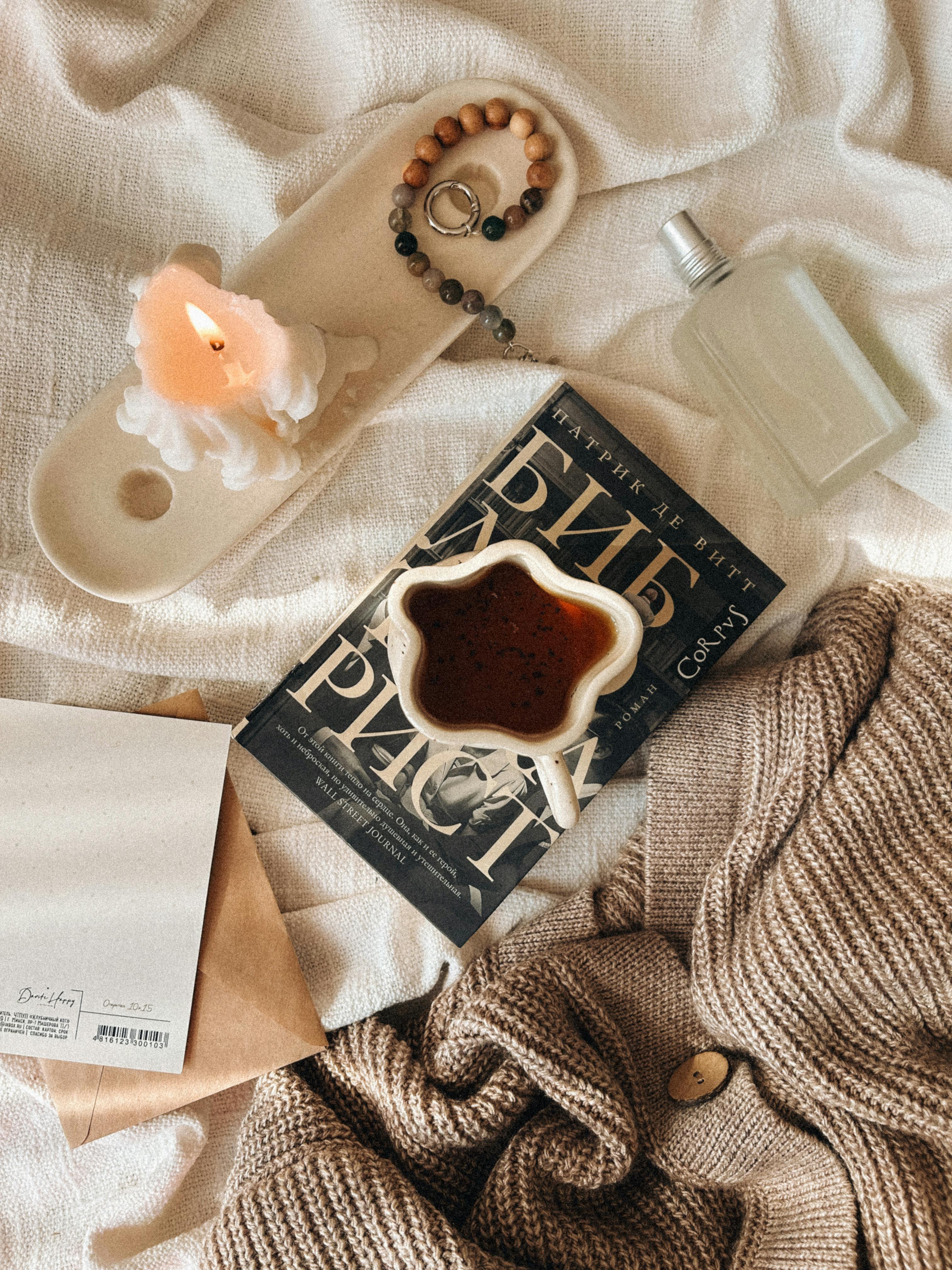 cozy flat lay with book and coffee