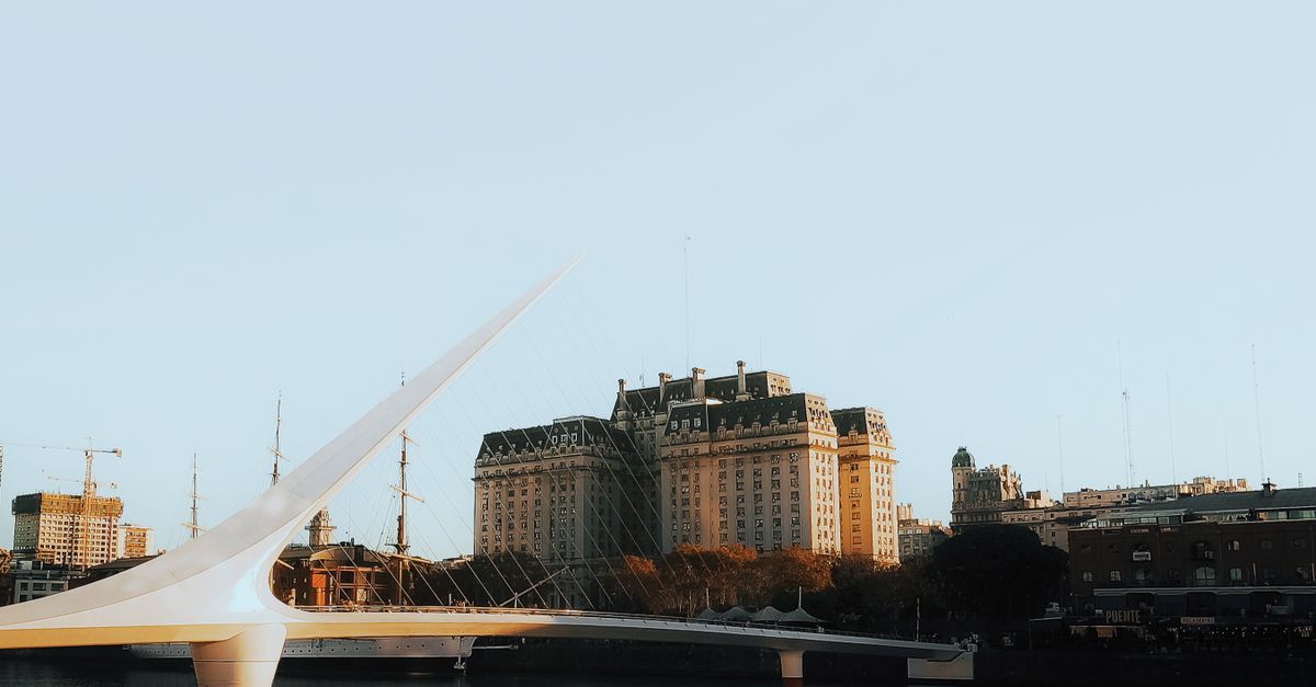 Captivating view of Puente de la Mujer in Buenos Aires at sunset.