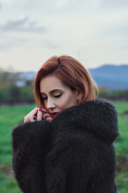 Woman Wearing Black Fur Coat