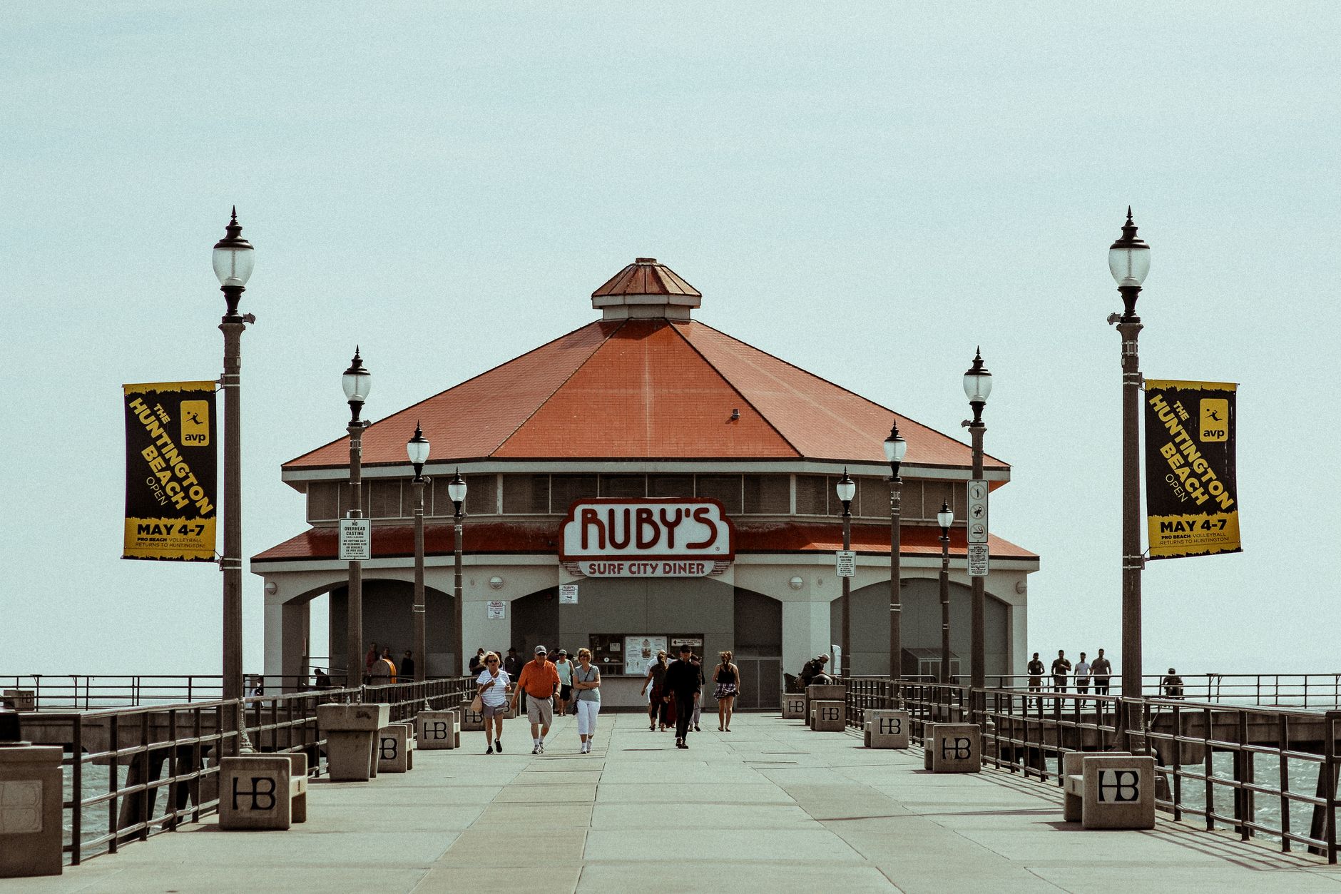 Iconic view of Ruby's diner on Huntington Beach pier, California, on a sunny day.