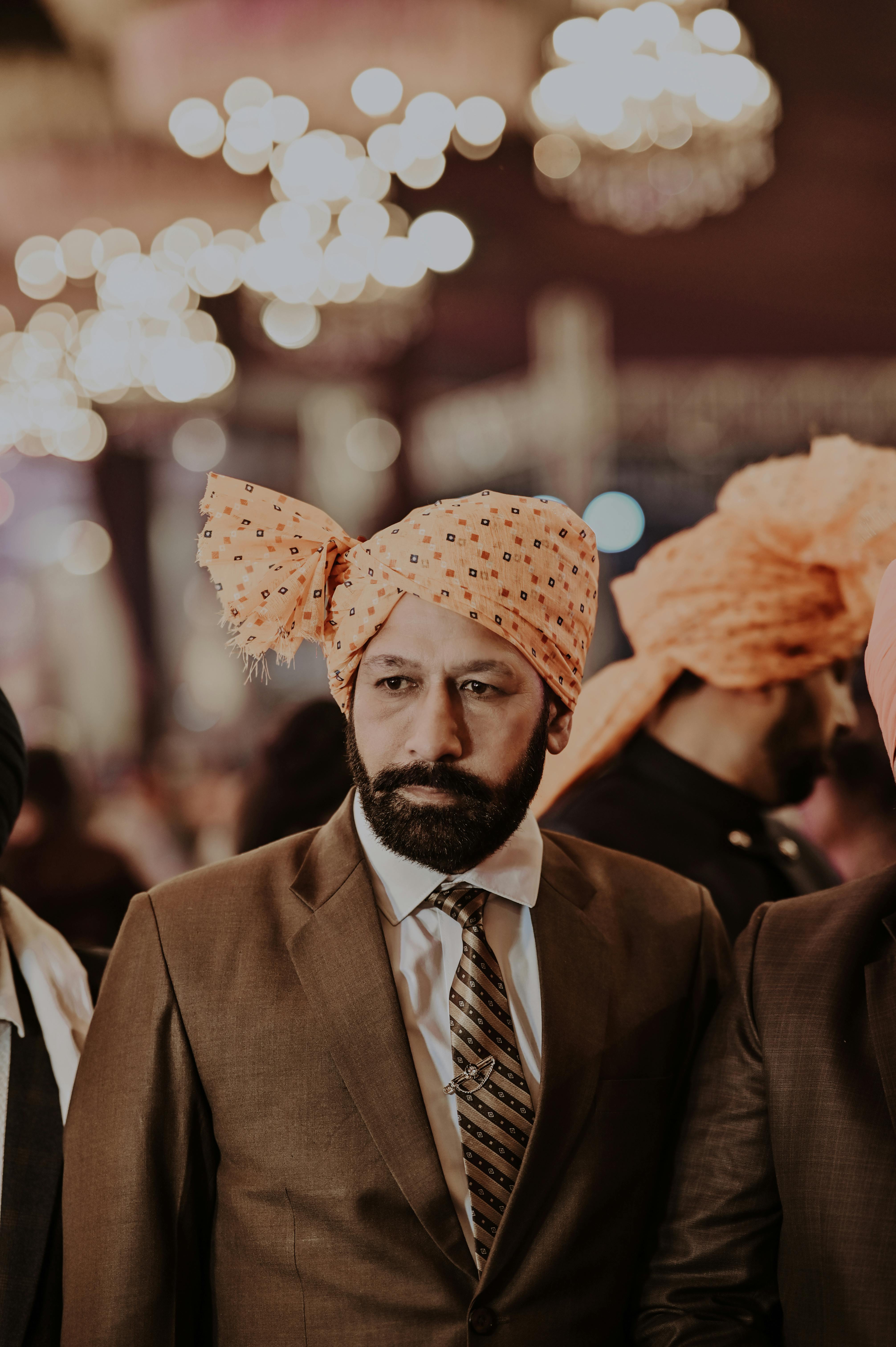 elegant wedding guest in traditional turban