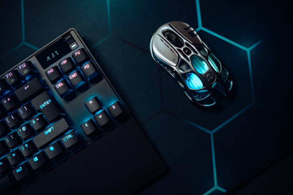 High-performance gaming mouse and mechanical keyboard with blue lighting