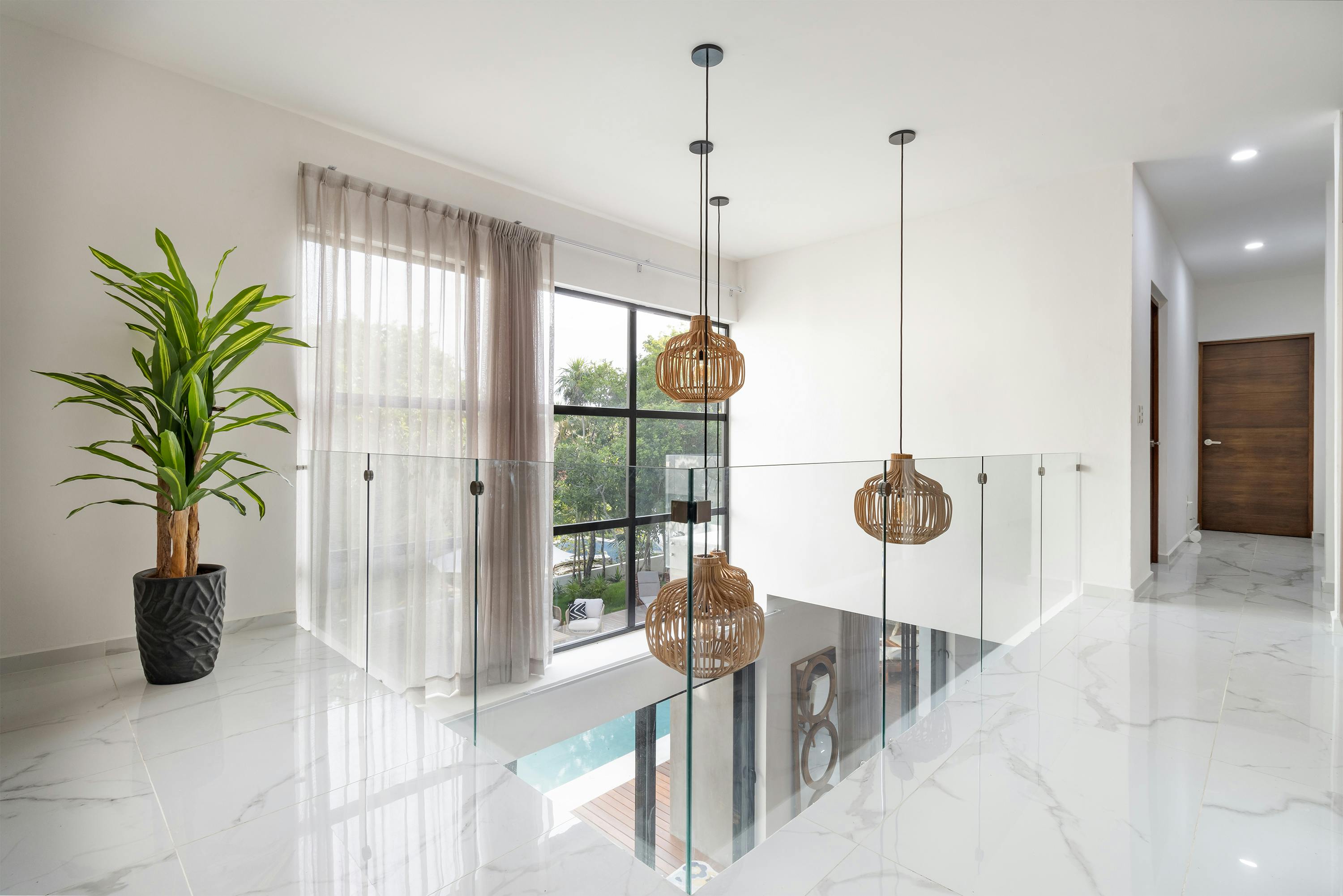 exclusive riviera maya experiences private - Spacious minimalist apartment with natural lighting and stylish decor.