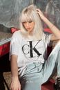 Photo Of Woman Wearing Calvin Klein Shirt