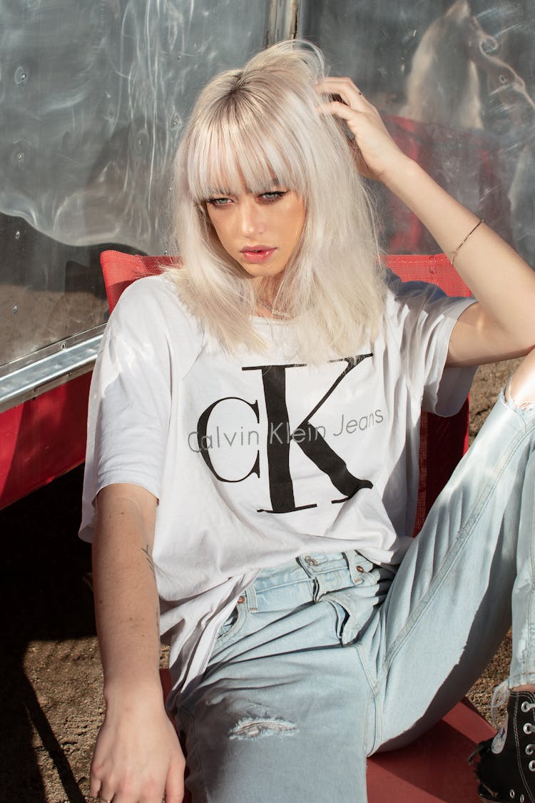 Photo Of Woman Wearing Calvin Klein Shirt