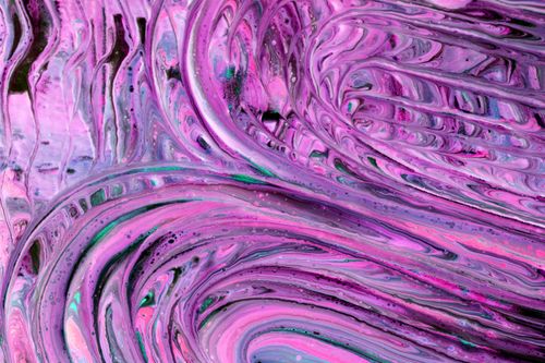 Free Vivid pink marble pattern with swirling abstract textures and bold colors. Stock Photo