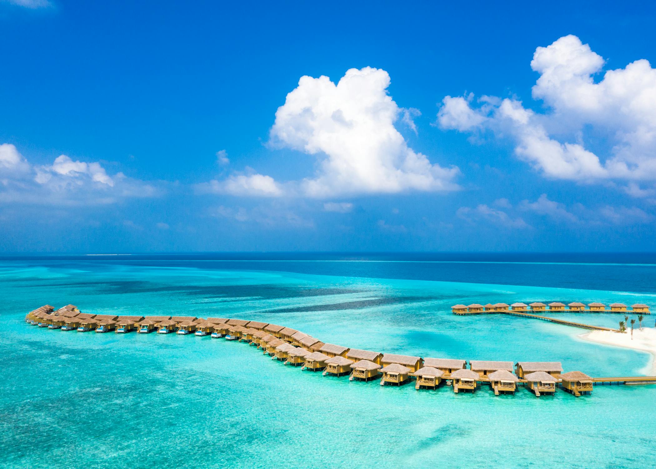 free photo of stunning aerial view of maldivian overwater bungalows