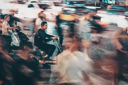 Man in Black and Gray Scooter