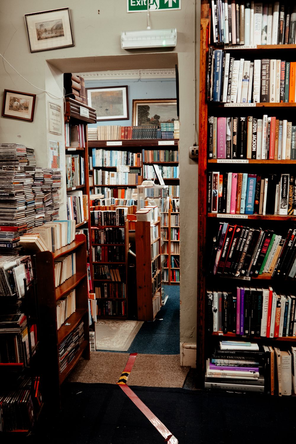 Cozy Bookstore Interior with Bookshelves · Free Stock Photo