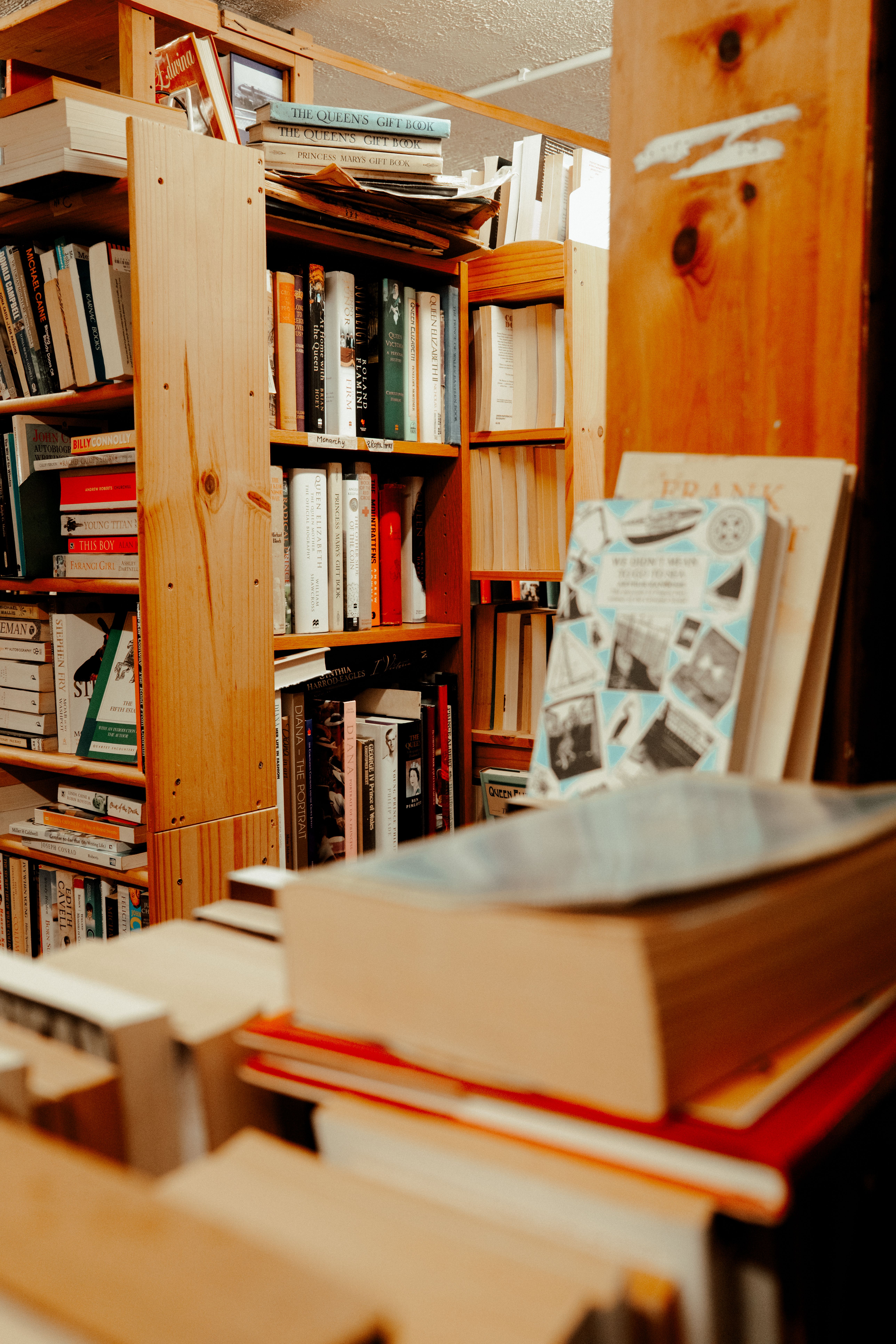 Literary paperback resting on a wooden table