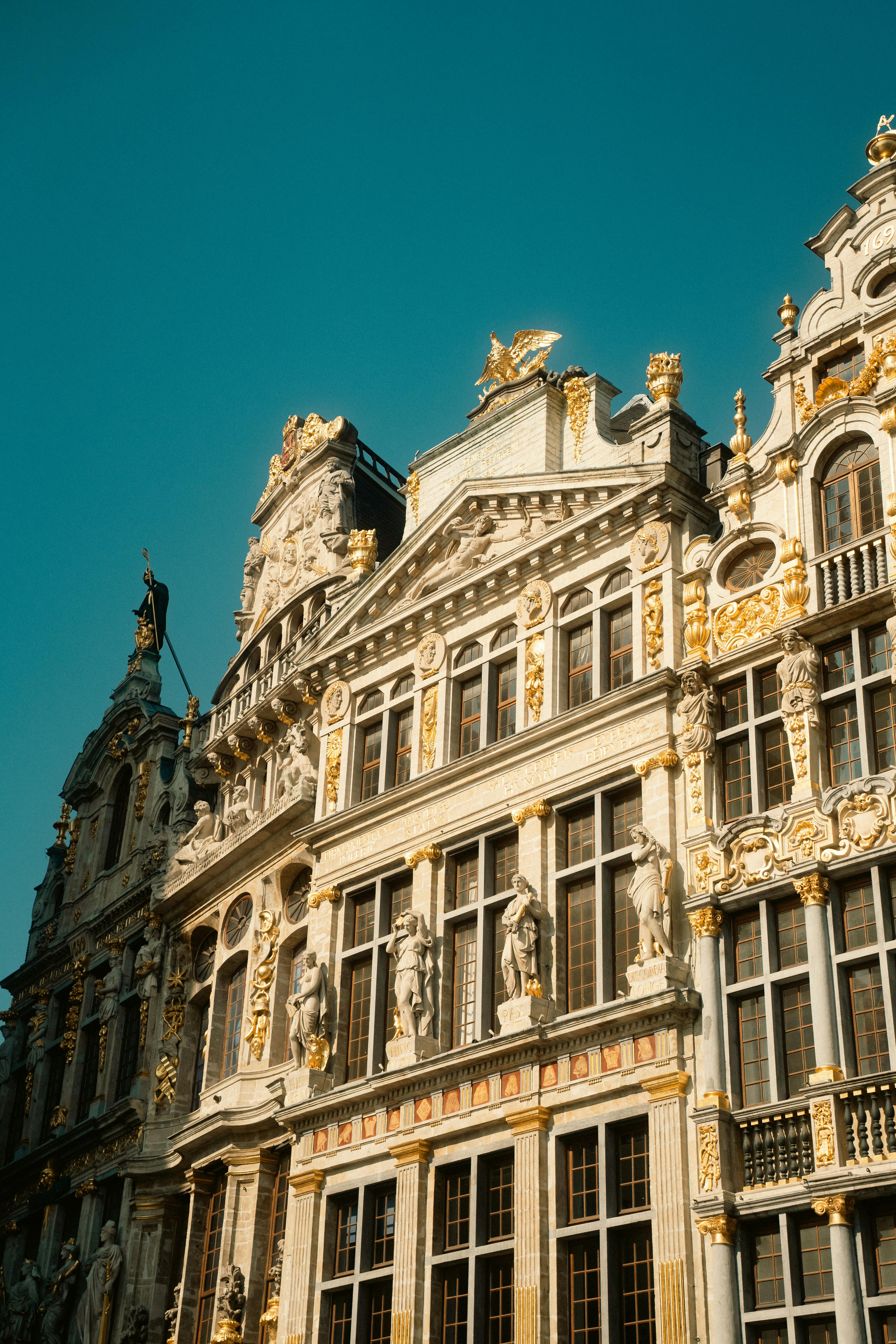 Stunning facade of a historic building in Brussels' Grand Place, showcasing ornate architecture.