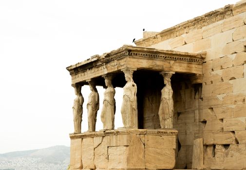 Classical architecture at the Acropolis featuring the Caryatids on the Erechtheion.