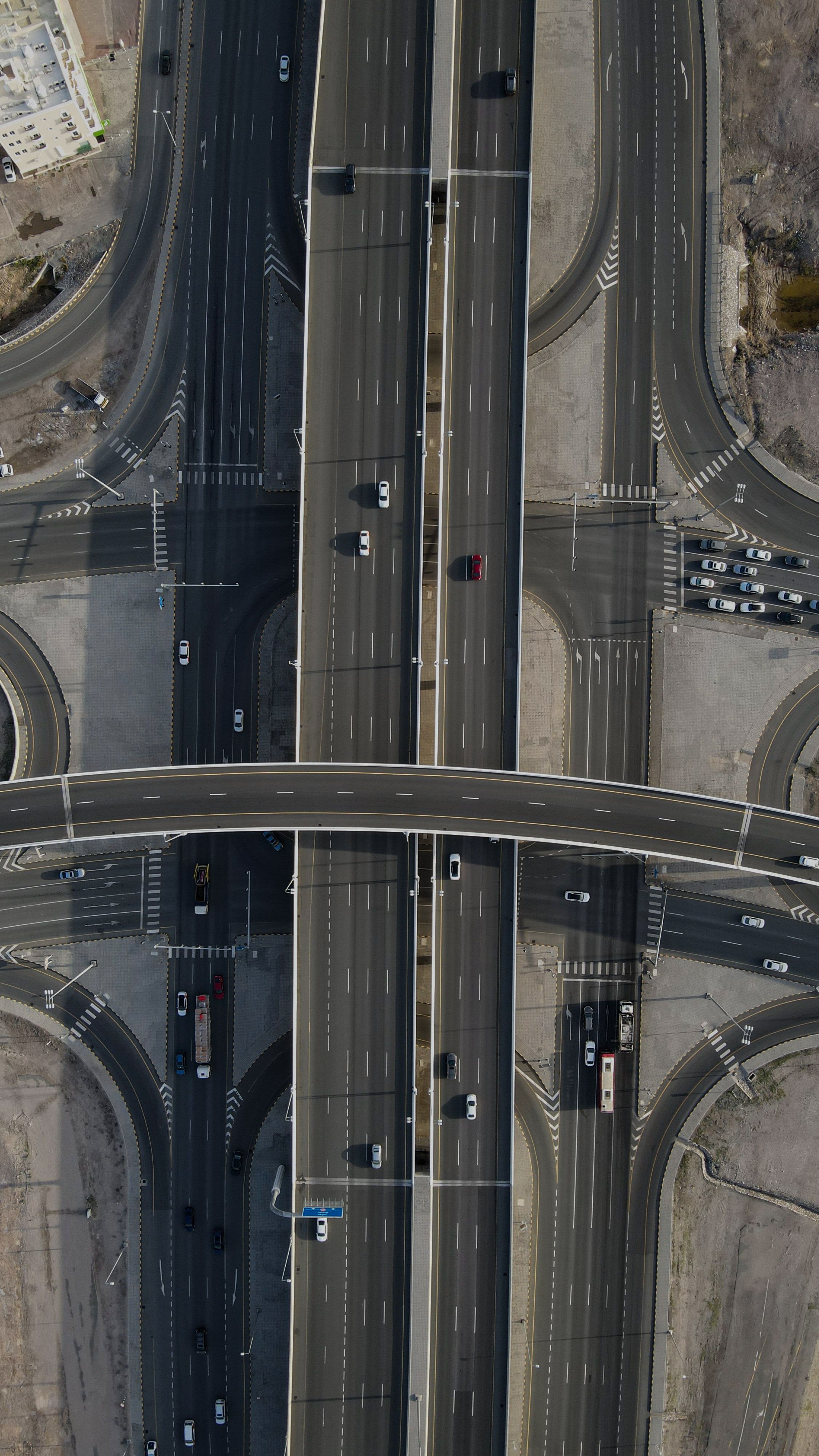 Aerial View of Modern Urban Highway Intersection · Free Stock Photo
