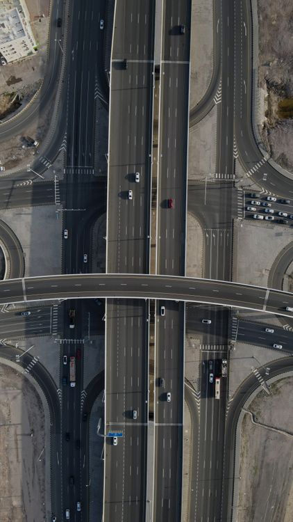 Aerial View of Modern Urban Highway Intersection · Free Stock Photo
