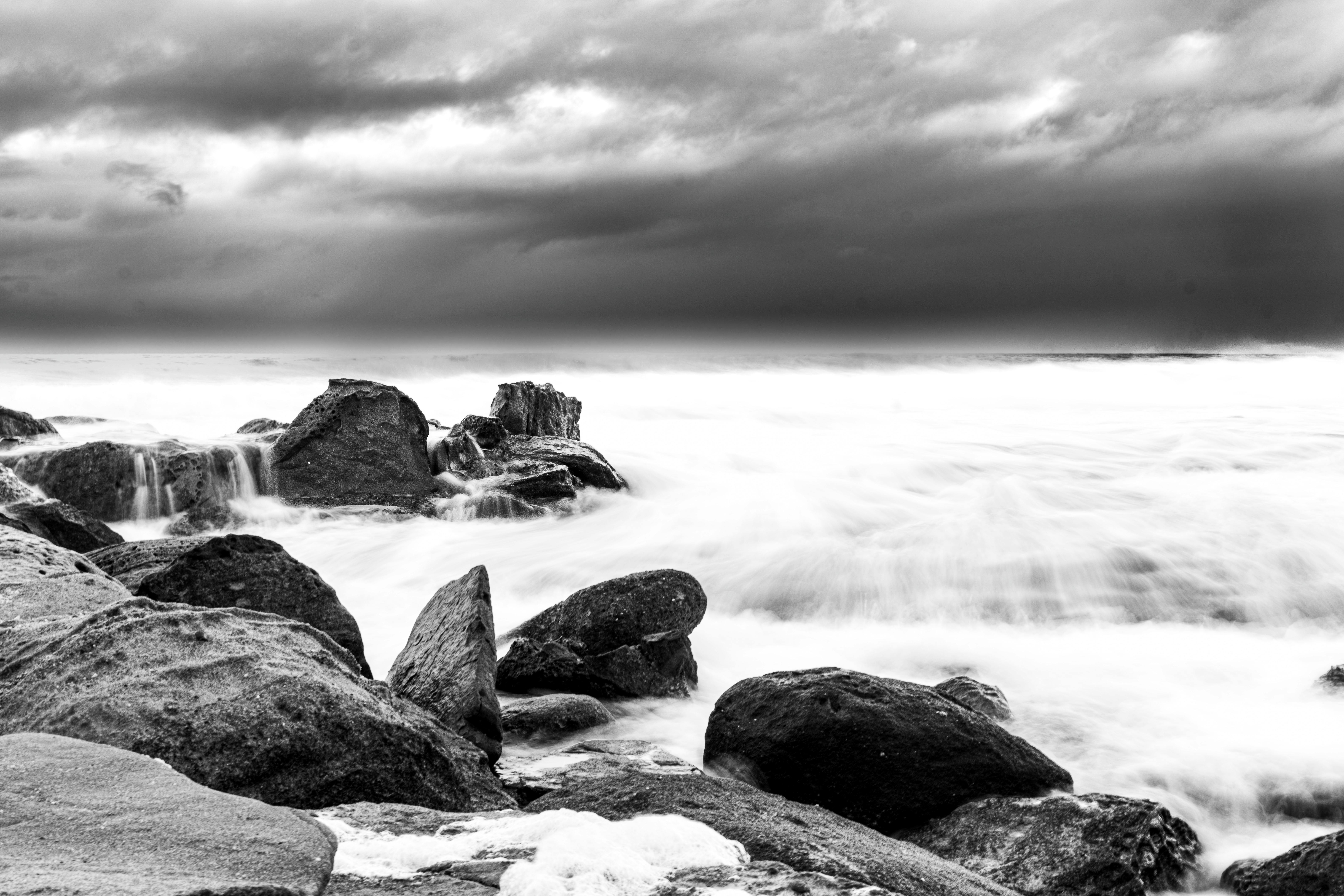 dramatic black and white coastal scene