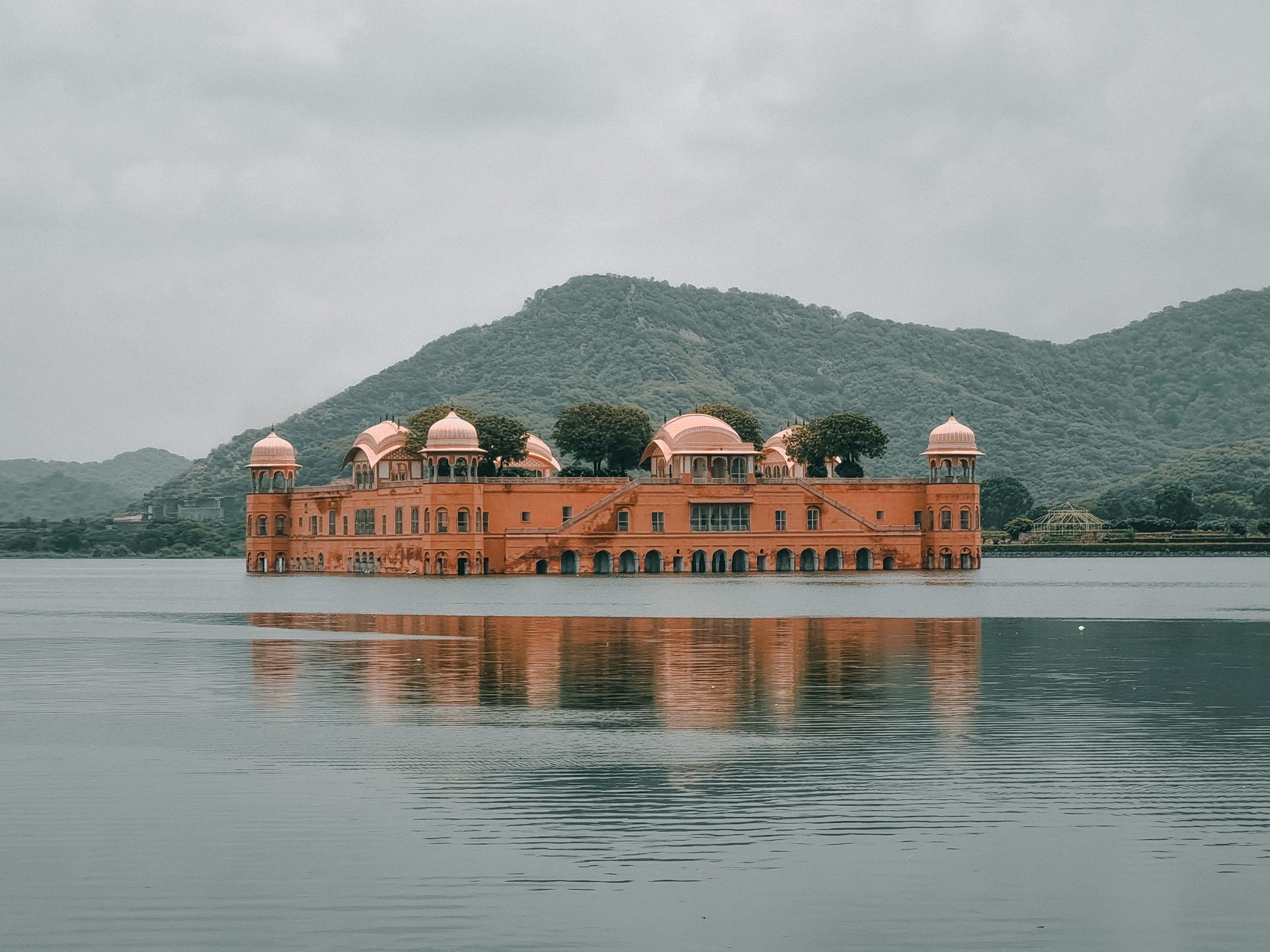 Stunning view of Jal Mahal Palace reflecting on Man Sagar Lake in Jaipur, India.