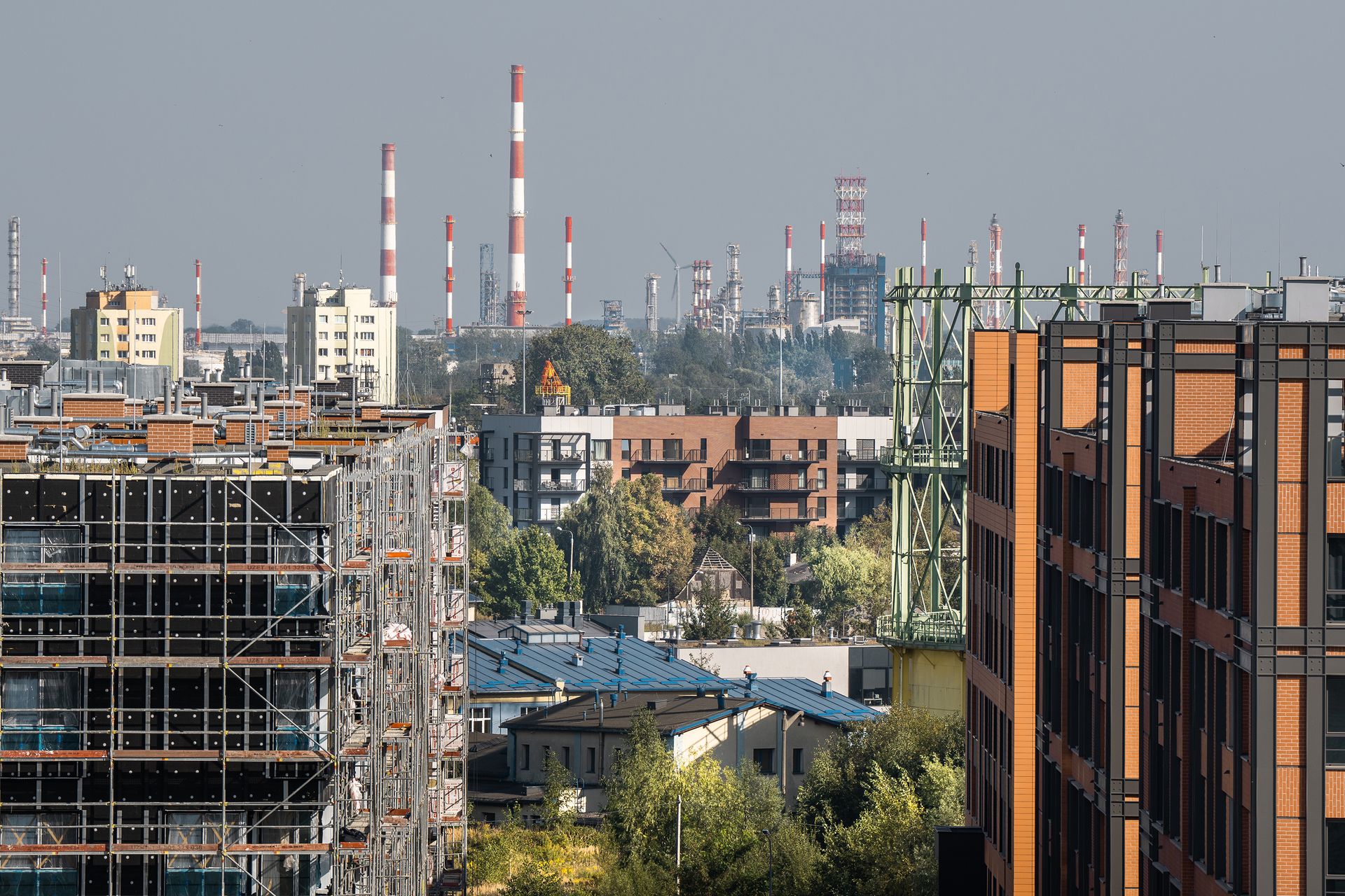 Cityscape featuring development and industrial chimneys in Gdansk.
